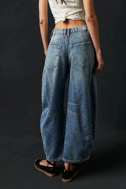 Dusty blue wide leg jeans with pockets from Trendsi, featuring a relaxed fit and casual style on a model.