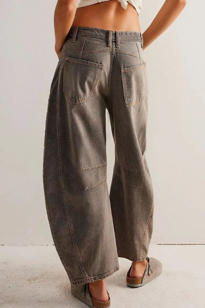 Dusty blue wide leg jeans with pockets from Trendsi, featuring a relaxed fit and classic denim style.