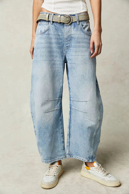 Dusty blue wide leg jeans with pockets from Trendsi, featuring a relaxed fit and stylish design.