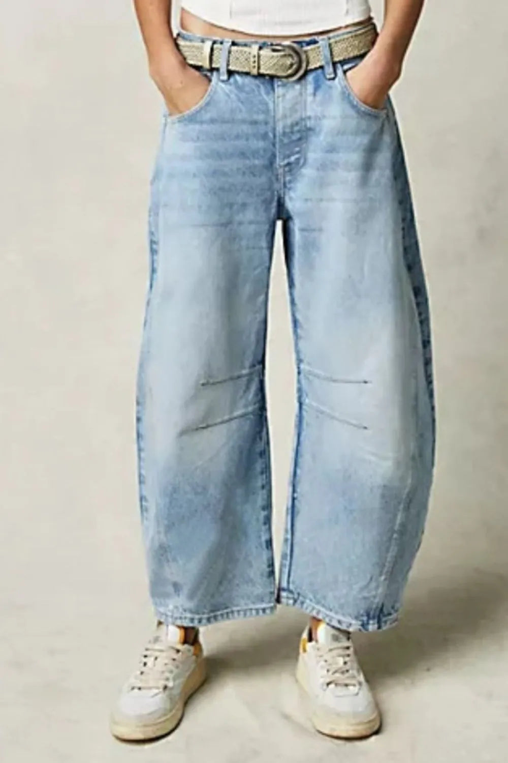 Dusty blue wide leg jeans with pockets from Trendsi, featuring a relaxed fit and classic denim style.