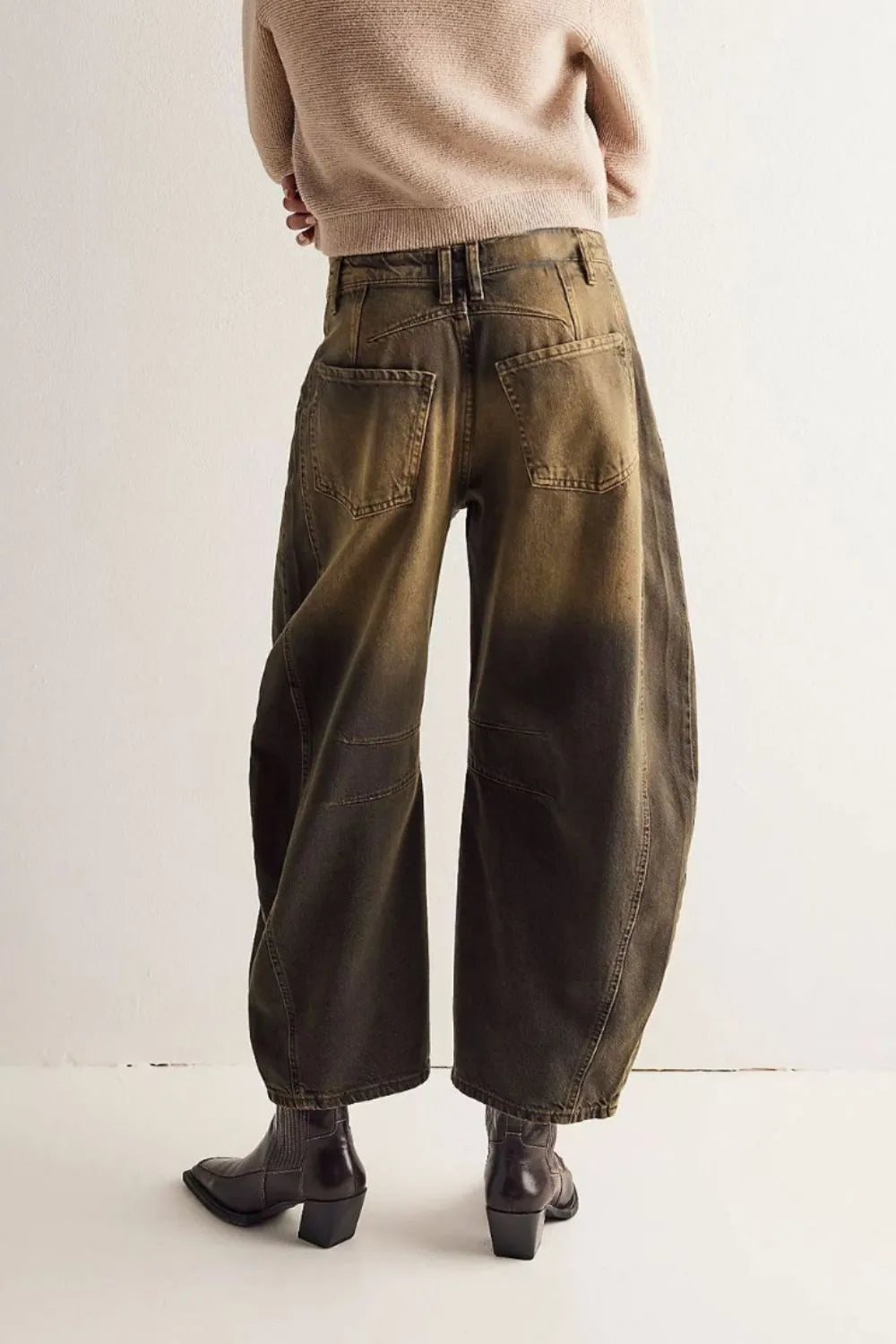 Dusty blue wide-leg jeans with front and back pockets from Trendsi, casual denim style, shown on a model.