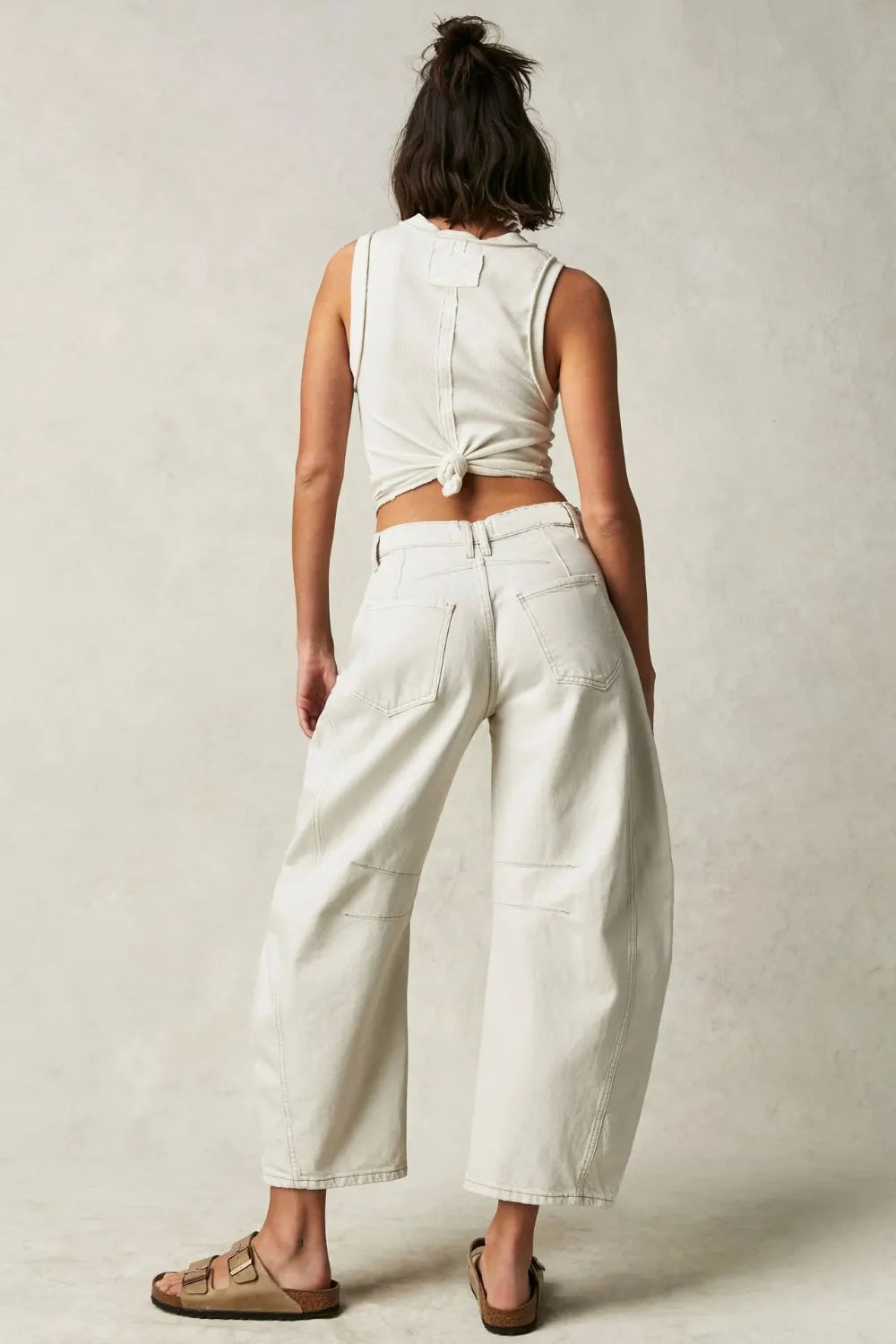 Dusty blue wide leg jeans with pockets from Trendsi, featuring a relaxed fit and casual denim style.