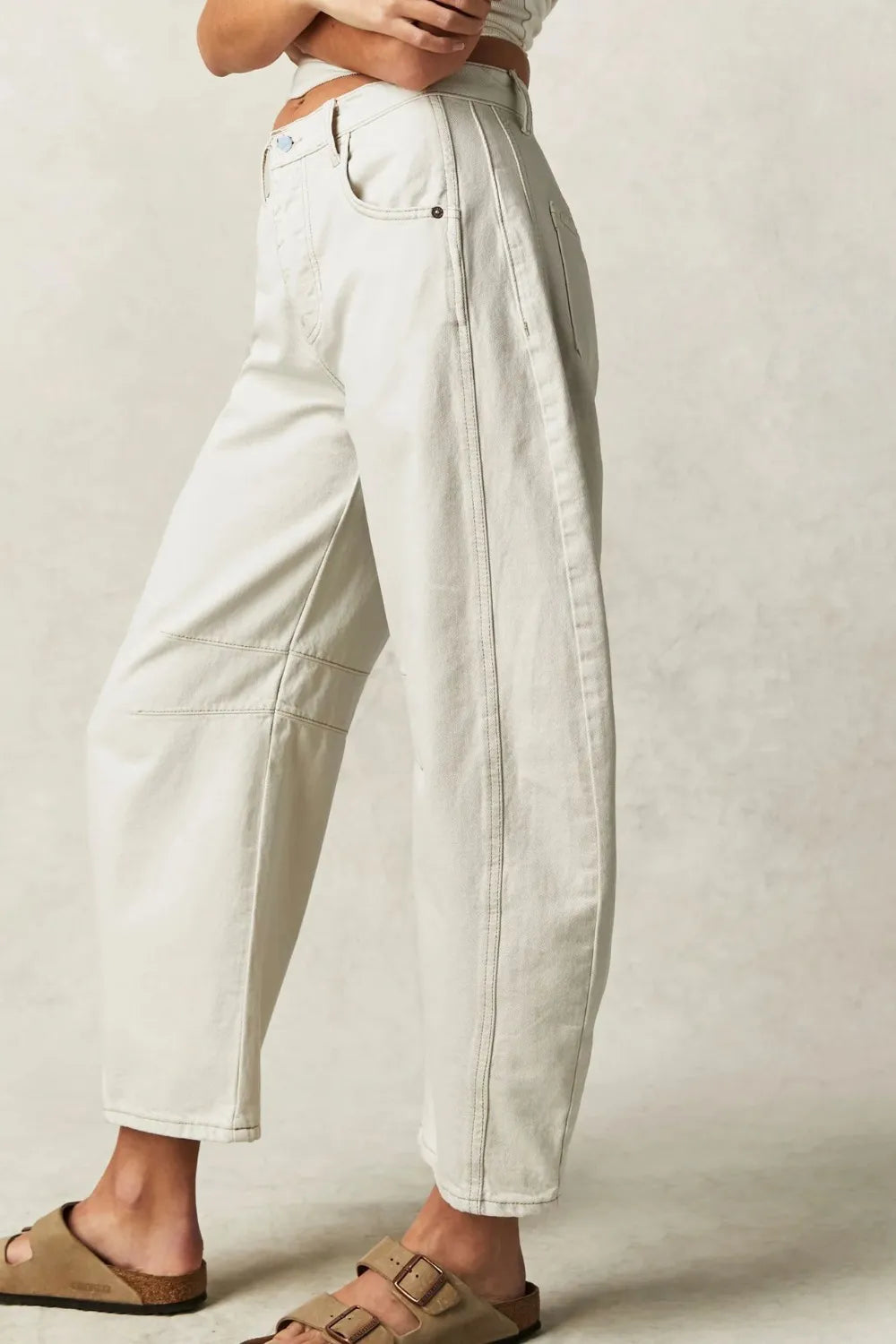 Dusty blue wide leg jeans with pockets from Trendsi, featuring a relaxed fit and casual style, shown on a model.
