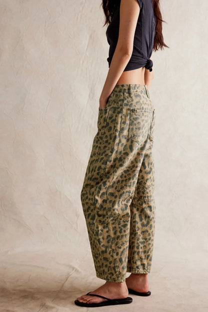 Dusty blue wide leg jeans with pockets from Trendsi, showing relaxed fit and stylish design on a model.