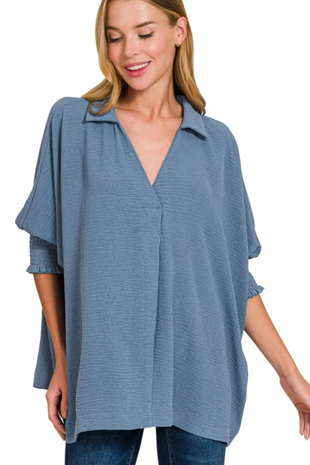 Dusty blue Zenana Airflow Collar Tee with smocked sleeve band, featuring a relaxed fit and breathable fabric.