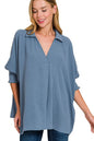 Dusty blue Zenana Airflow Collar Tee with smocked sleeve band, featuring a relaxed fit and breathable fabric.