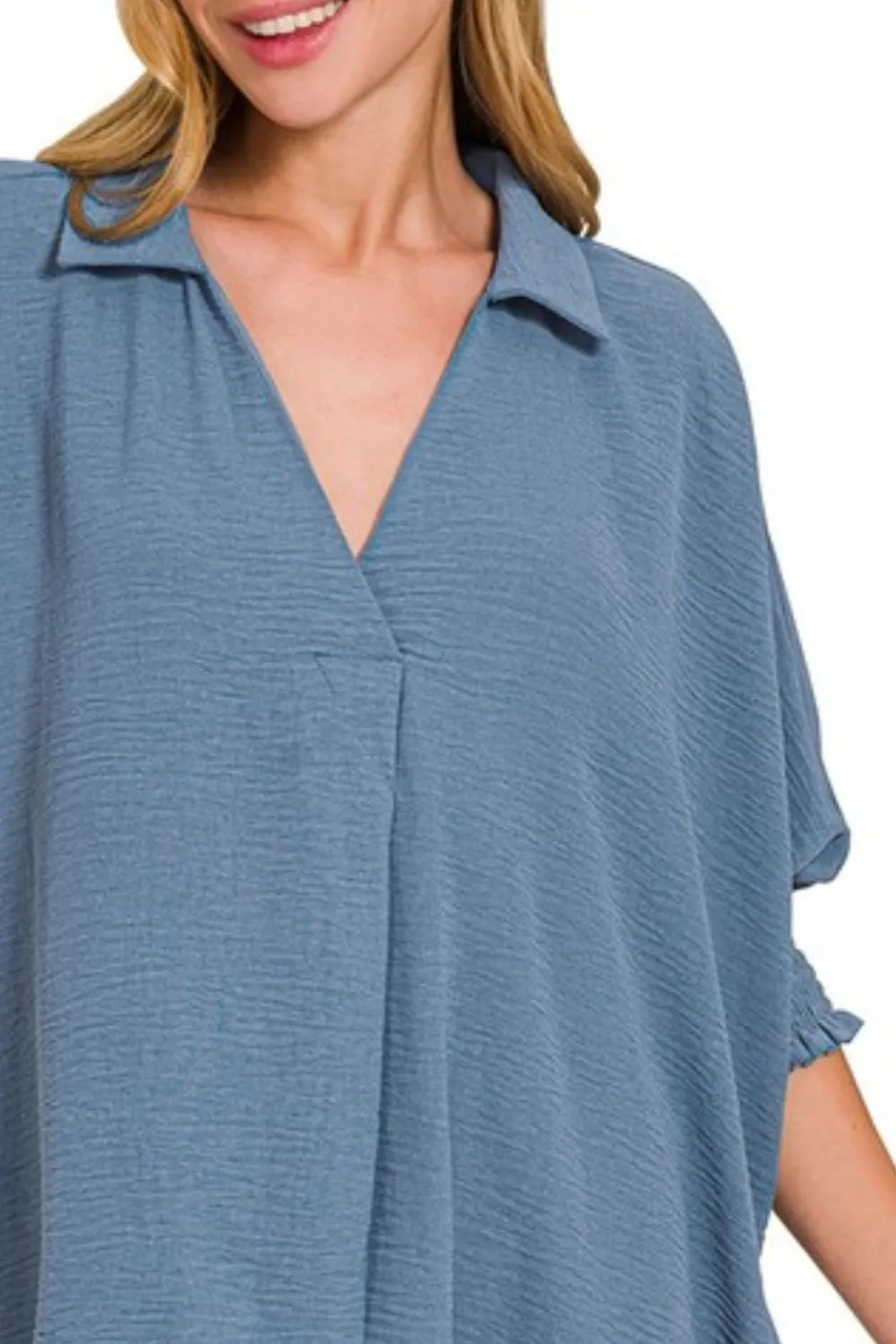 Dusty blue Zenana Airflow Collar Tee with smocked sleeve band, casual women's top featuring a relaxed fit and breathable fabric.