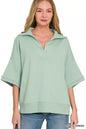 Dusty green Zenana scuba collared short sleeve pullover, casual women's top with a relaxed fit and simple style.