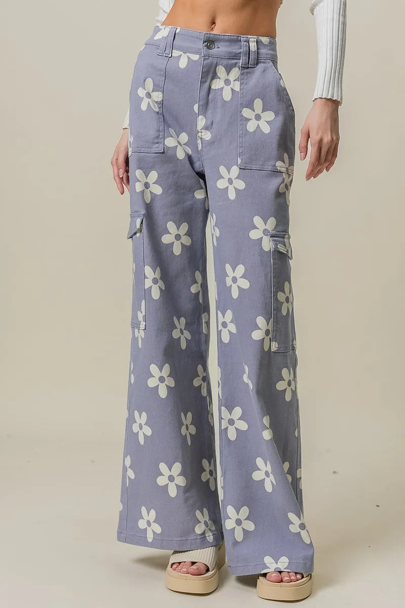 Dusty lavender BiBi Flower printed wide pants with side pockets from Trendsi, featuring a relaxed, flowy fit and floral design.