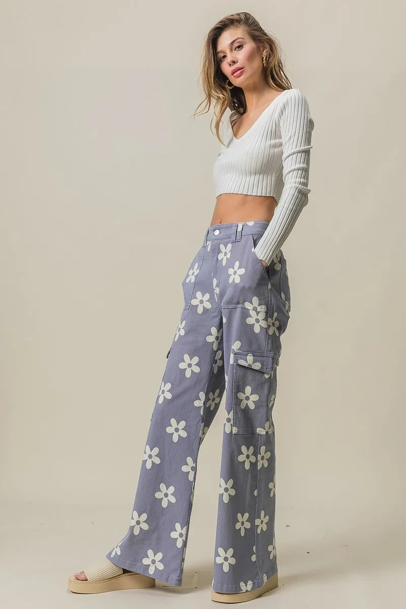 Dusty lavender Bibi flower printed wide pants with side pockets from Trendsi, featuring a relaxed fit and floral pattern.