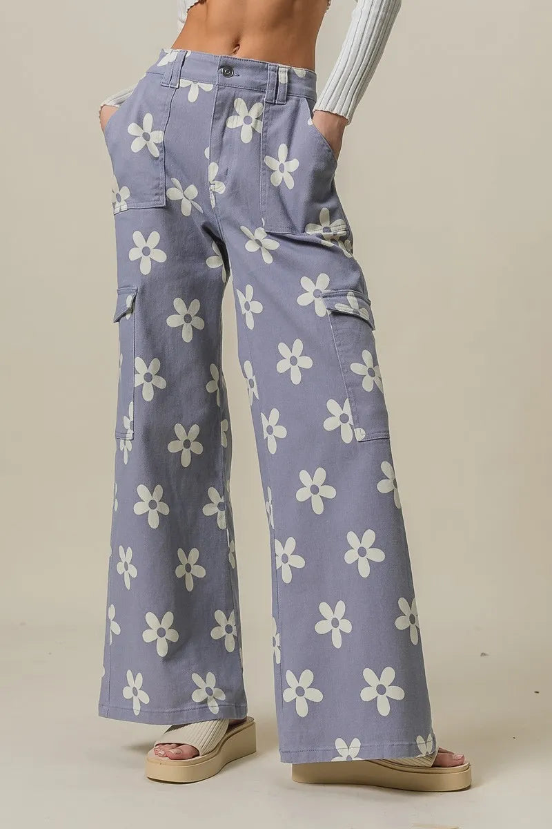 Dusty lavender BiBi Flower printed wide pants with side pockets from Trendsi, featuring a relaxed fit and floral design.