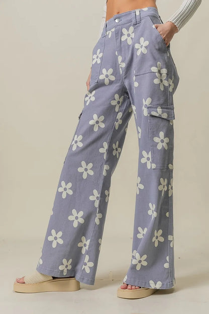 Dusty lavender BiBi Flower printed wide pants with side pockets from Trendsi, featuring a comfortable and stylish relaxed fit.