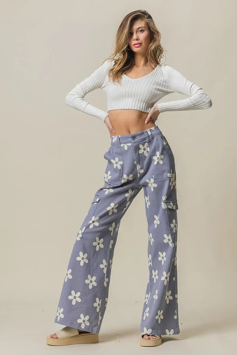 Dusty lavender BiBi flower printed wide pants by Trendsi with side pockets and a relaxed fit.