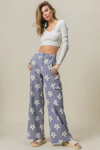 Dusty lavender BiBi Flower printed wide pants with side pockets, designed by Trendsi, featuring a relaxed, flowy fit.