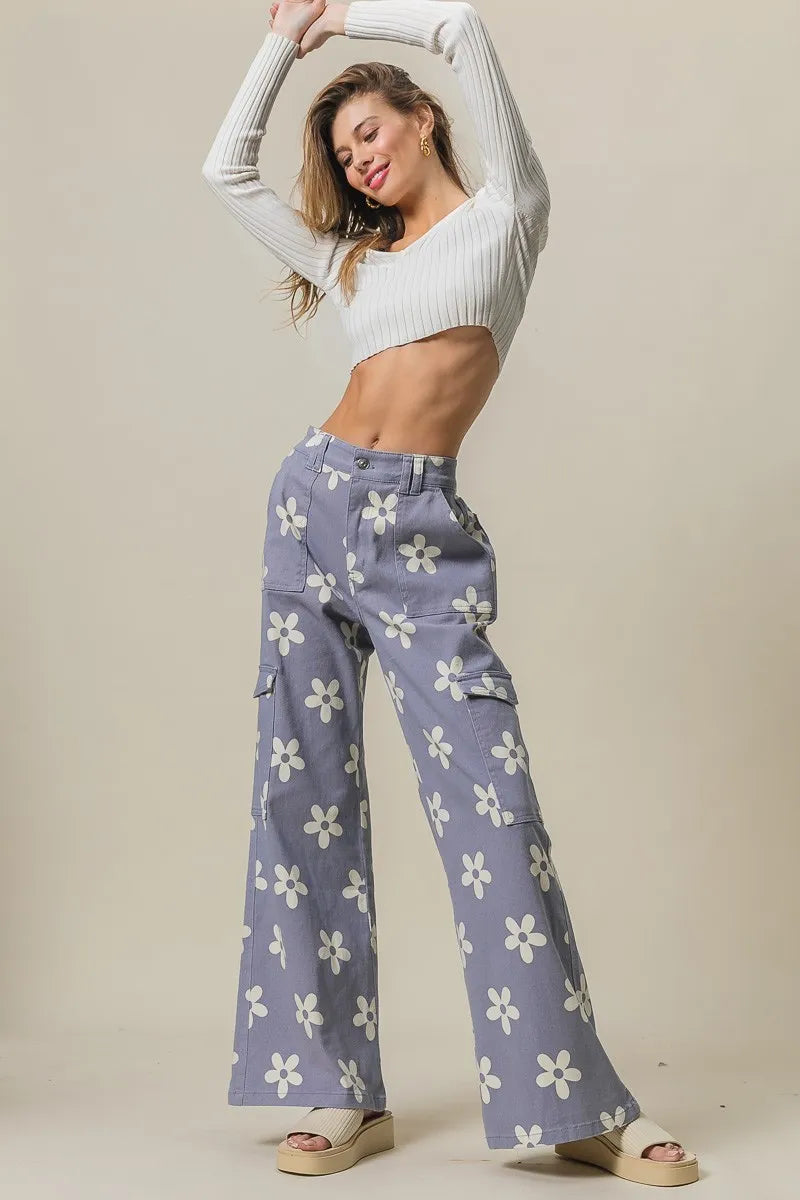 Dusty lavender wide pants with Bibi flower print and side pockets, stylish and comfortable for casual wear by Trendsi.