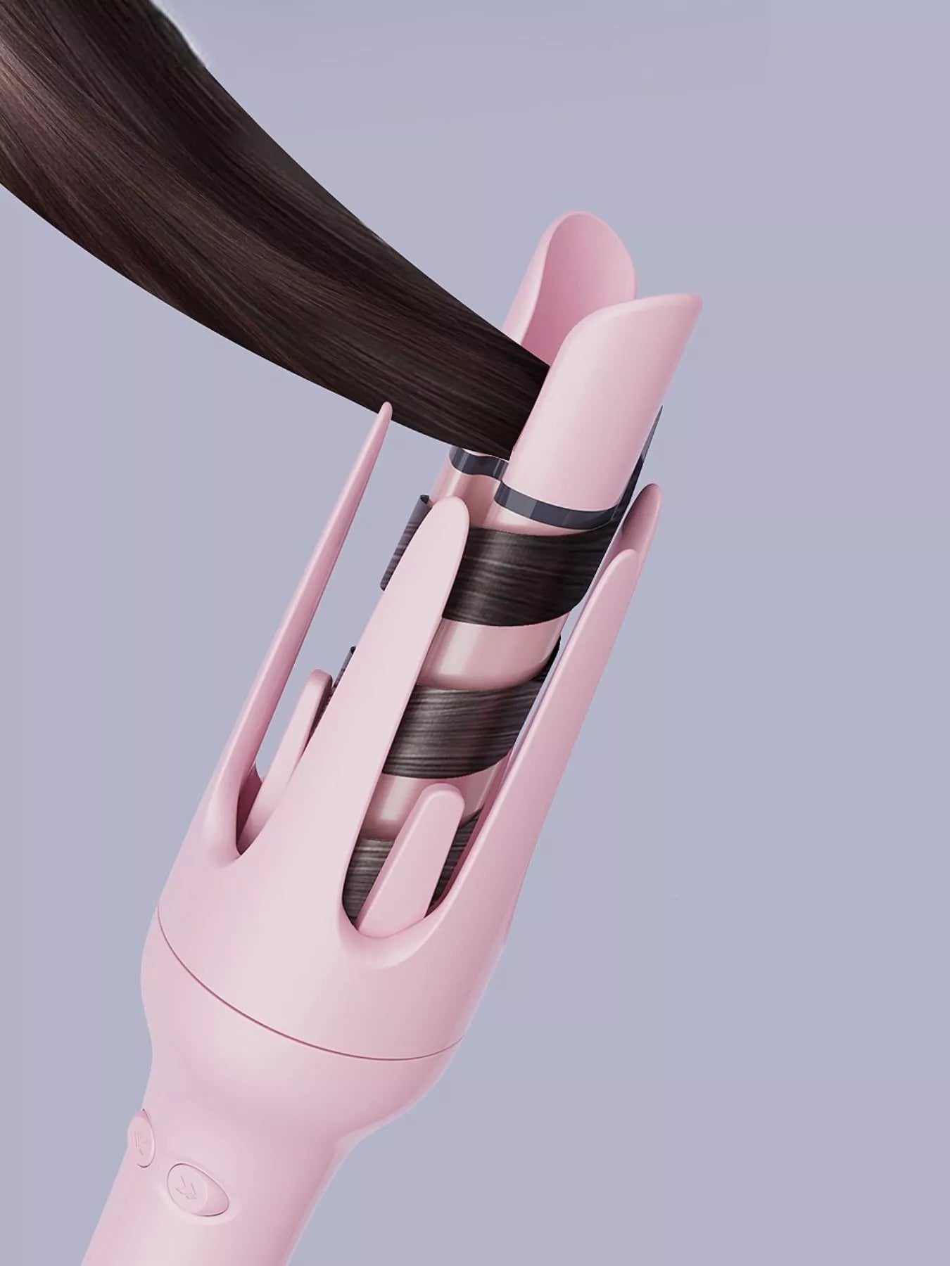 Dusty pink automatic rotating ceramic hair curling iron by Trendsi with European plug, showcasing its sleek design and rotating barrel.