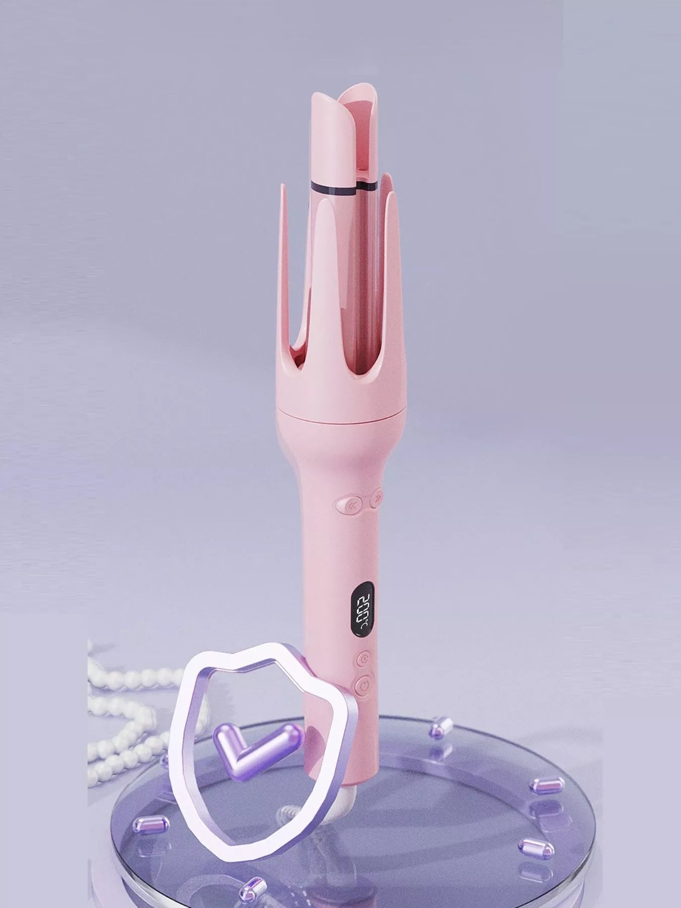 Dusty pink automatic rotating ceramic hair curling iron by Trendsi with European plug, showcasing its sleek design and rotating barrel.