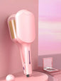 Dusty pink Trendsi fast heating curling iron with European plug, showcasing a sleek design for creating curls and waves.