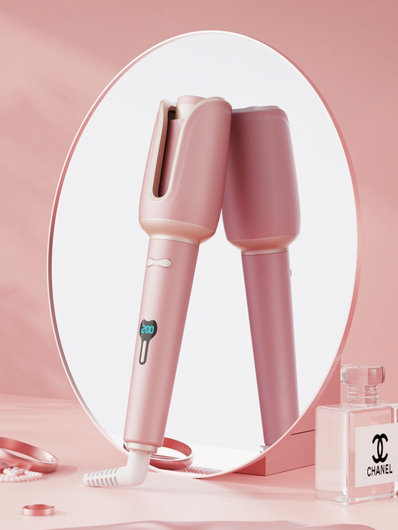 Dusty pink automatic rotating ceramic hair curling iron by Trendsi with North American plug, designed for effortless curling.