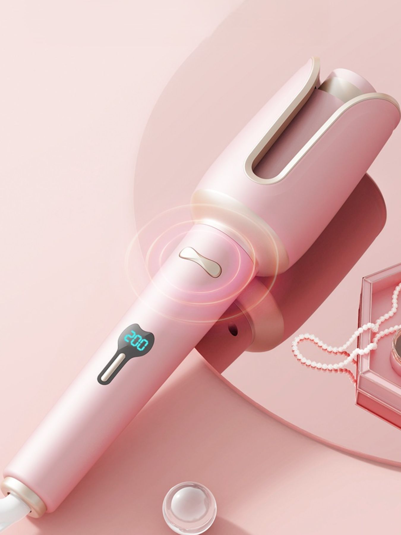 Dusty pink Trendsi automatic rotating ceramic hair curling iron with North American plug and sleek design.
