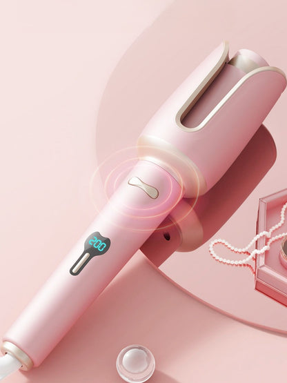 Dusty pink Trendsi automatic rotating ceramic hair curling iron with North American plug and sleek design.
