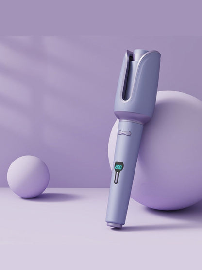 Dusty pink automatic rotating ceramic hair curling iron by Trendsi with North American plug for easy styling.
