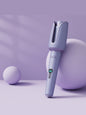 Dusty pink automatic rotating ceramic hair curling iron by Trendsi with North American plug for easy styling.