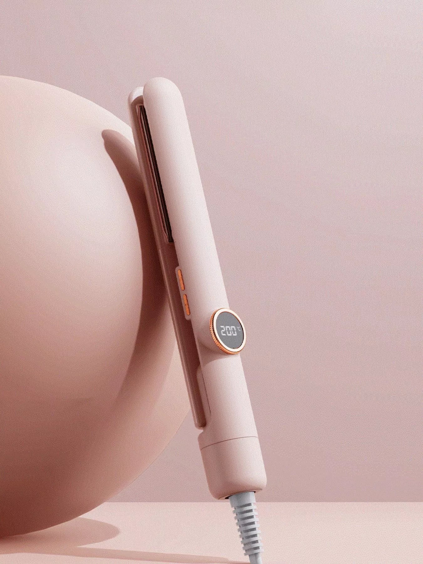 Dusty pink Trendsi fast heating hair straightener with North American plug, ceramic plates, and sleek design for smooth styling.