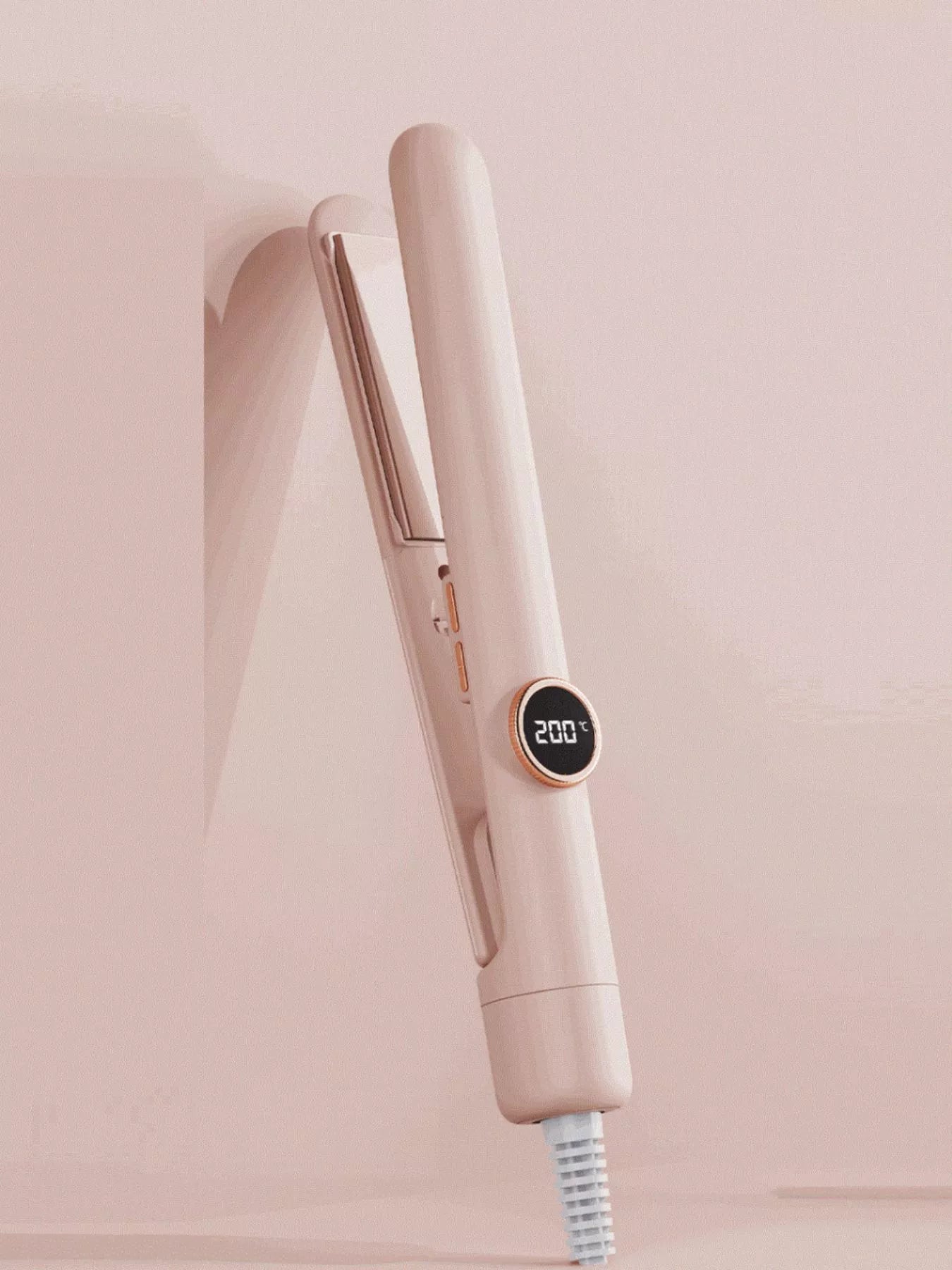 Dusty pink Trendsi fast heating hair straightener with North American plug, sleek design, and ceramic plates for smooth styling.