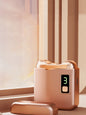 Dusty pink portable electric nail buffer by Trendsi, compact handheld device with multiple polishing and buffing surfaces for manicures.