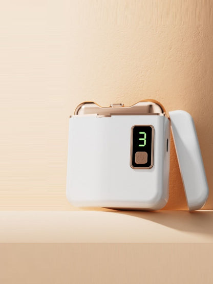Dusty pink portable electric nail buffer from Trendsi, compact design with multiple buffers for smooth, shiny nails.