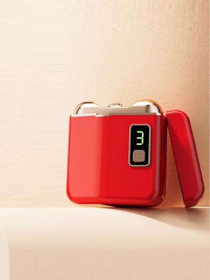 Dusty pink portable electric nail buffer by Trendsi with compact design and multiple polishing surfaces for professional nail care.