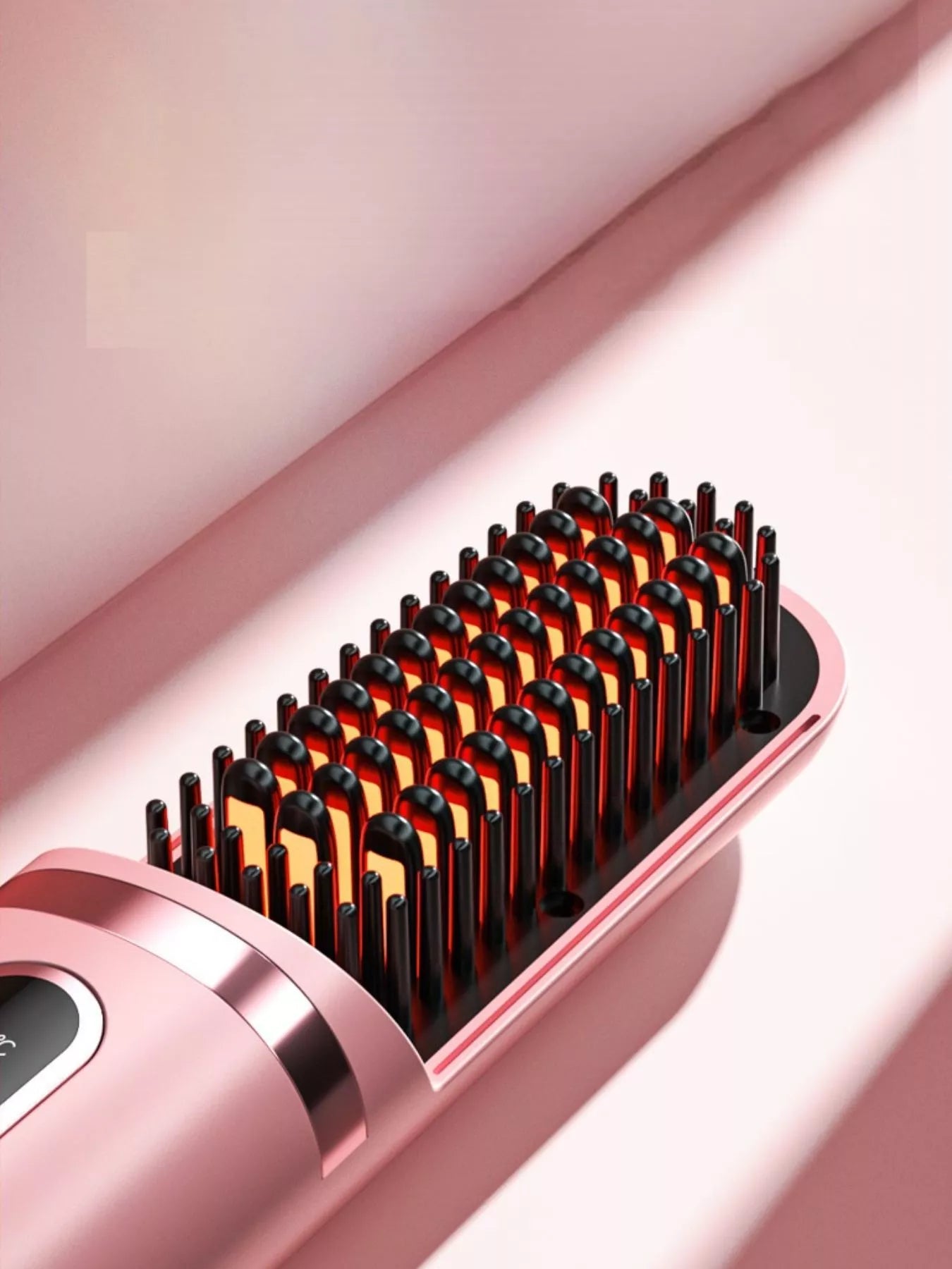 Dusty pink portable heated hair straightening comb by Trendsi, compact and designed for quick styling on the go.