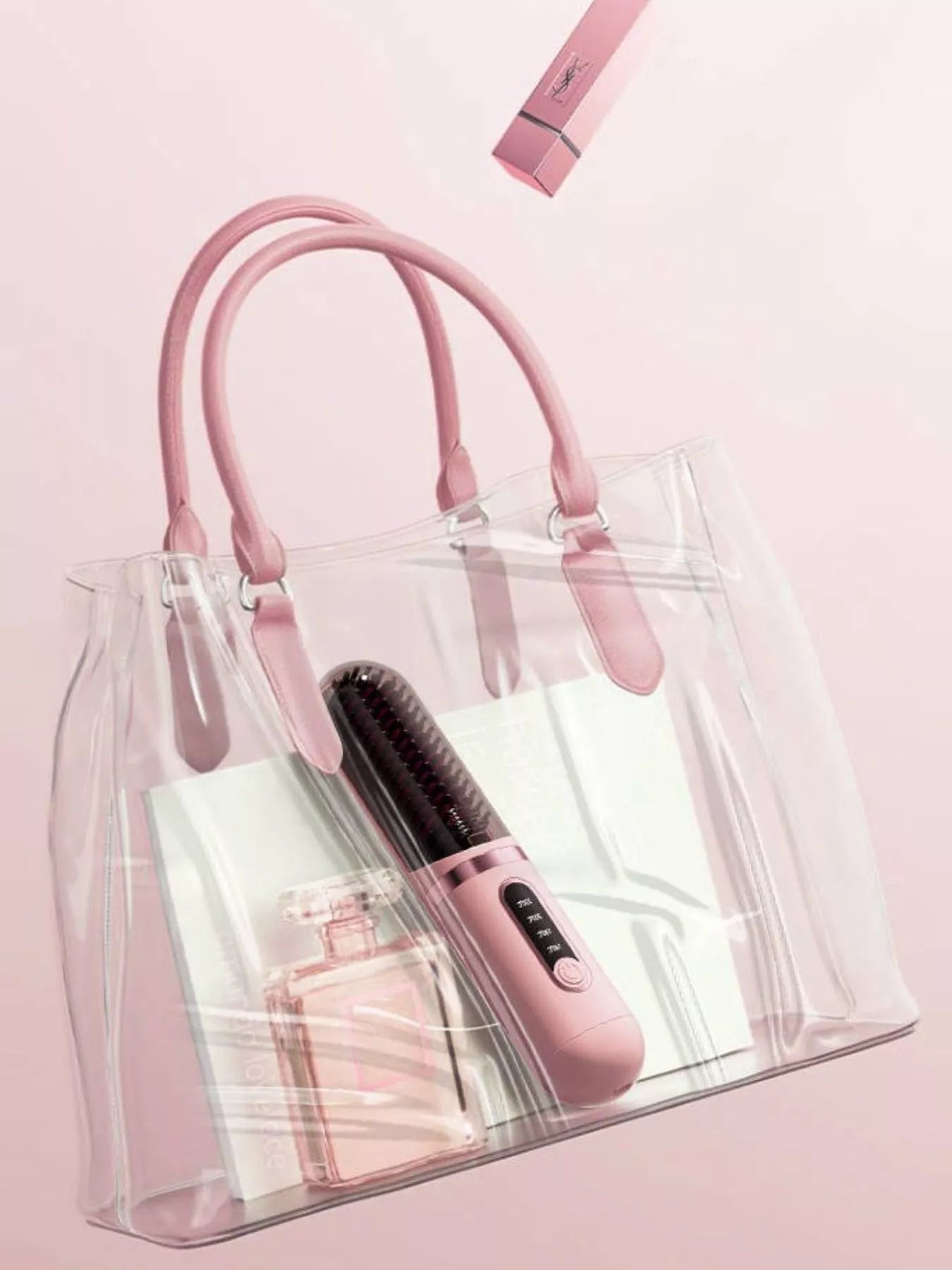 Dusty pink portable heated hair straightening comb by Trendsi, compact and easy to use for quick styling.