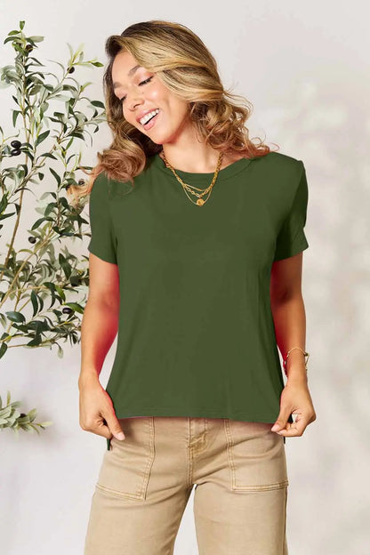 Dusty pink Basic Bae full-size round neck short sleeve T-shirt by Trendsi, shown on a hanger with a plain background.