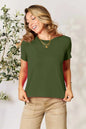 Dusty pink Basic Bae full-size round neck short sleeve T-shirt by Trendsi, shown on a hanger with a plain background.