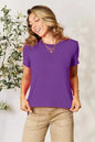 Dusty pink Basic Bae full-size round neck short sleeve T-shirt by Trendsi, displayed flat showing front view of the casual top.