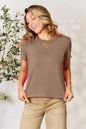 Dusty pink Basic Bae full-size round neck short sleeve T-shirt by Trendsi, shown laid flat with soft fabric texture.