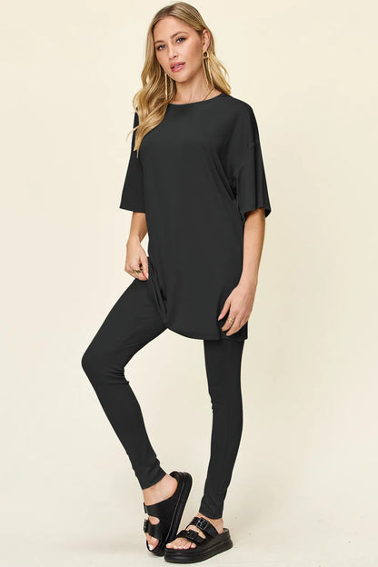 Dusty pink Trendsi double take full-size t-shirt and leggings set with round neck and dropped shoulders, casual activewear ensemble.