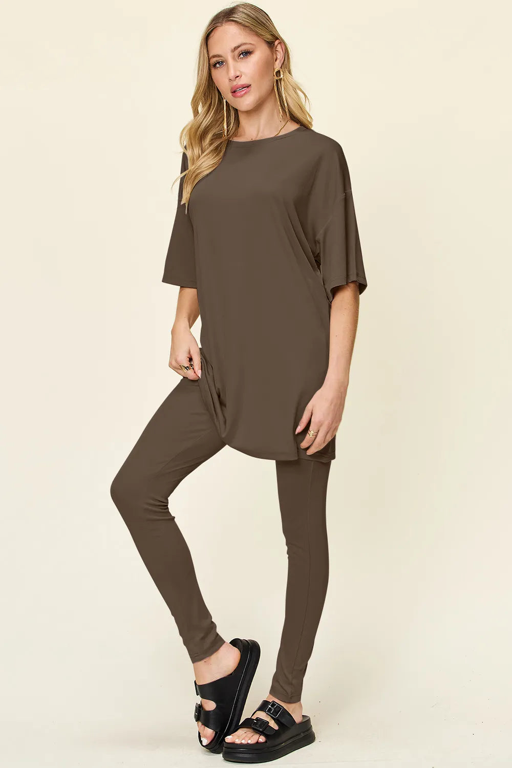 Dusty pink Trendsi Double Take full-size round neck dropped shoulder T-shirt and matching leggings set, casual and comfortable.