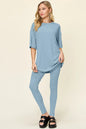 Dusty pink double take full-size T-shirt and leggings set featuring a round neck and dropped shoulders by Trendsi.