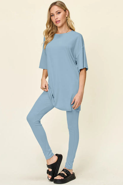 Dusty pink Trendsi Double Take full-size round neck dropped shoulder T-shirt and leggings set, casual and comfortable.