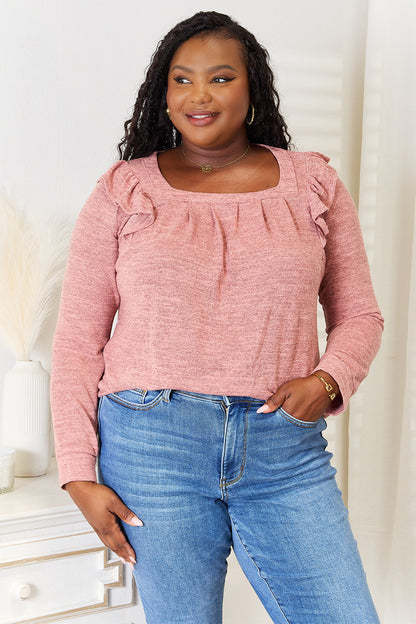 Dusty pink long sleeve T-shirt with square neckline and ruffle shoulder details from Trendsi, featuring a fitted, stylish design.