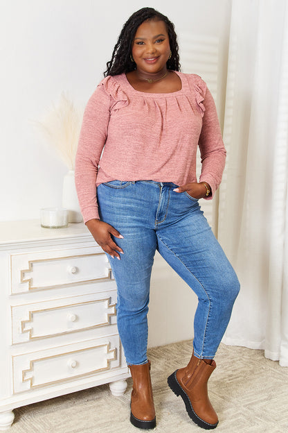 Dusty pink long sleeve T-shirt with square neckline and ruffle shoulder details from Trendsi, showcasing a stylish casual top.