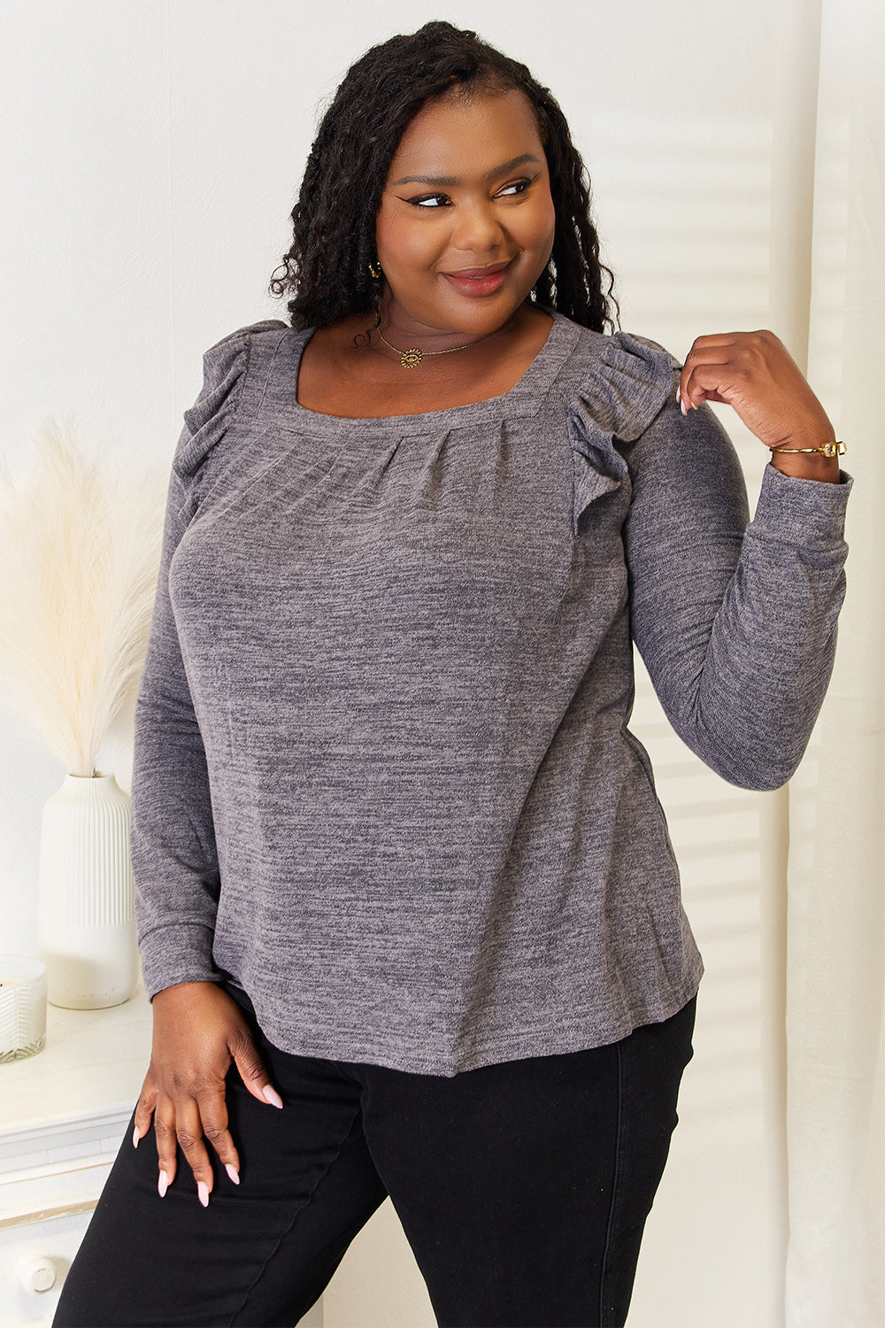 Dusty pink Trendsi Double Take square neck ruffle shoulder long sleeve T-shirt displayed on a model with ruffle details and long sleeves.