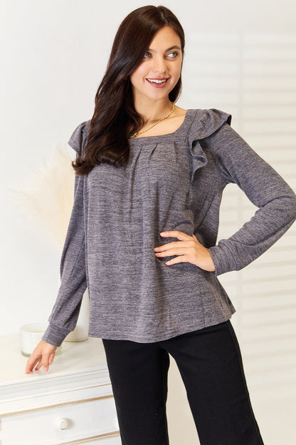 Dusty pink long sleeve T-shirt with square neckline and ruffle shoulder details from Trendsi, featuring a stylish, casual design.