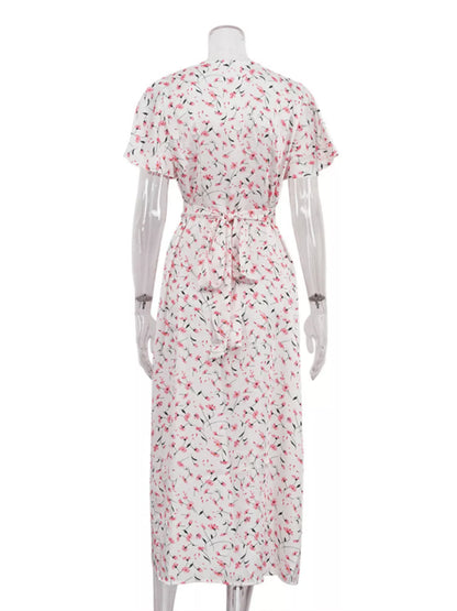 Dusty pink floral print V-neck midi dress with flutter sleeves, stylish and elegant by Trendsi.