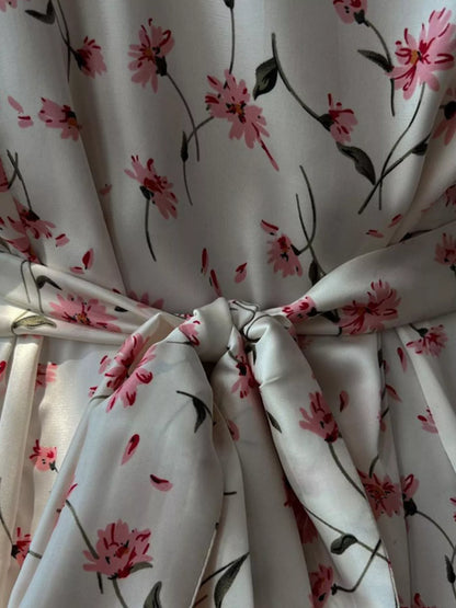 Dusty pink floral print midi dress with v-neck and flutter sleeves, stylish Trendsi women's fashion dress.
