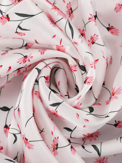 Dusty pink floral print V-neck midi dress with flutter sleeves by Trendsi, featuring a flowy, elegant design perfect for summer.