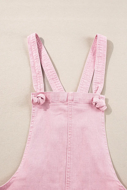 Dusty pink denim overalls with knot straps and front pockets, trendy Trendsi women's casual jumpsuit or overall outfit.